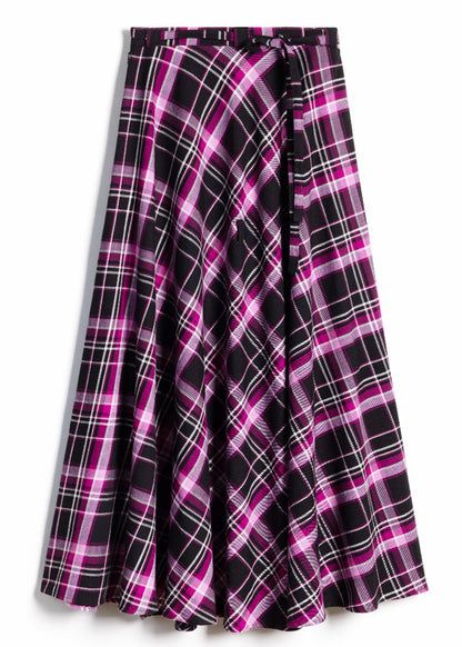 A high-waisted, A-line plaid skirt in black, magenta pink, and white, featuring a wrap-style front with a tie closure at the waist.