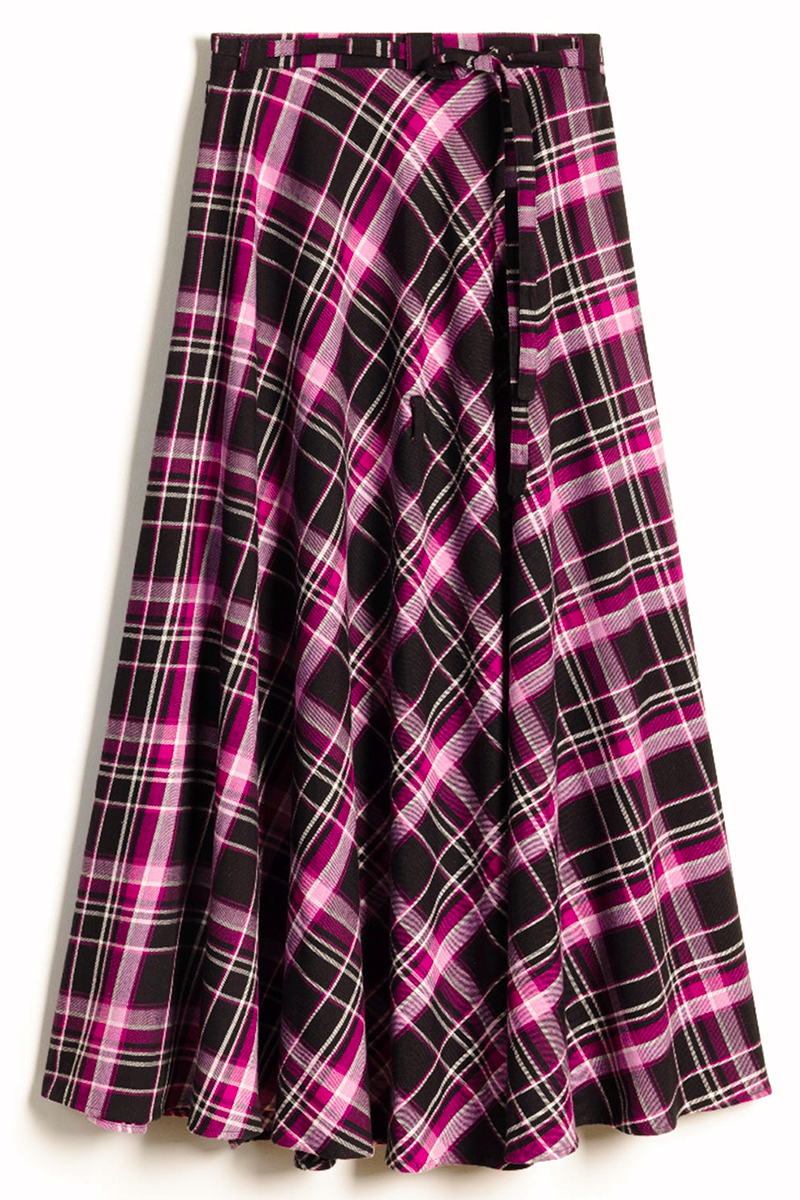 A high-waisted, A-line plaid skirt in black, magenta pink, and white, featuring a wrap-style front with a tie closure at the waist.