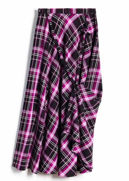A long wrap-style skirt with a black, pink, and white plaid pattern, displayed against a plain white background.