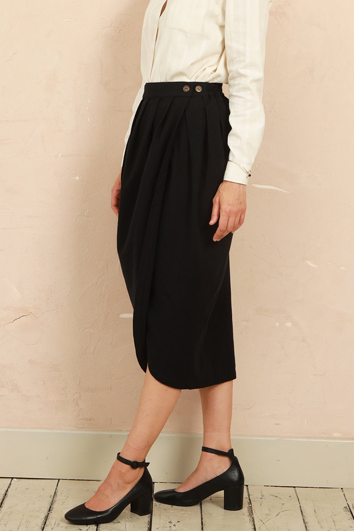 The black Venus Skirt showing natural coconut shell buttons