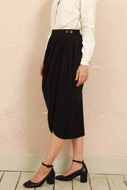 The black Venus Skirt showing natural coconut shell buttons