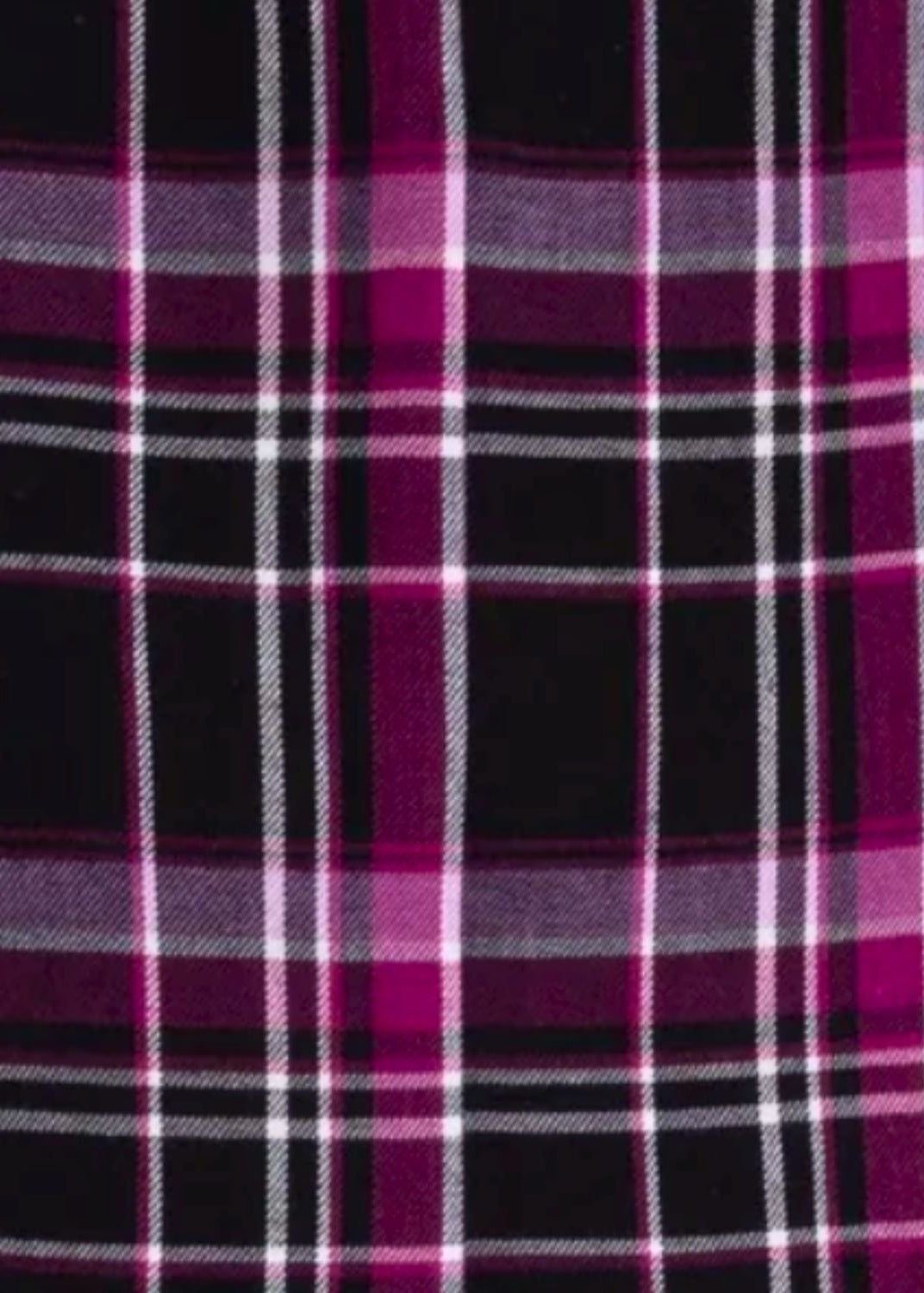 A close-up of a plaid fabric pattern with black, magenta pink, and white stripes.