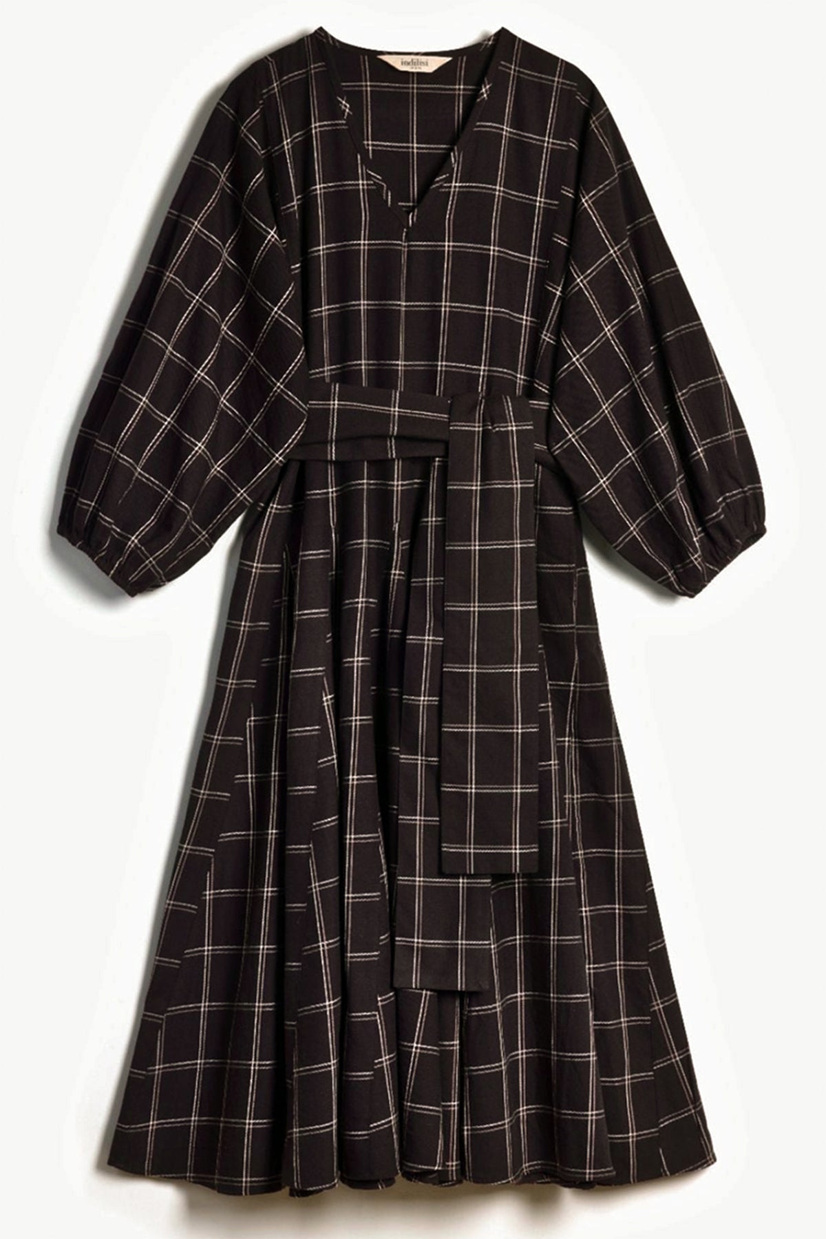 Flat lay product shot of the black and white check Penny Dress on a plain background