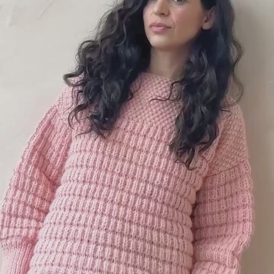 Model wearing the candyfloss pink boat neck sweater, editorial video