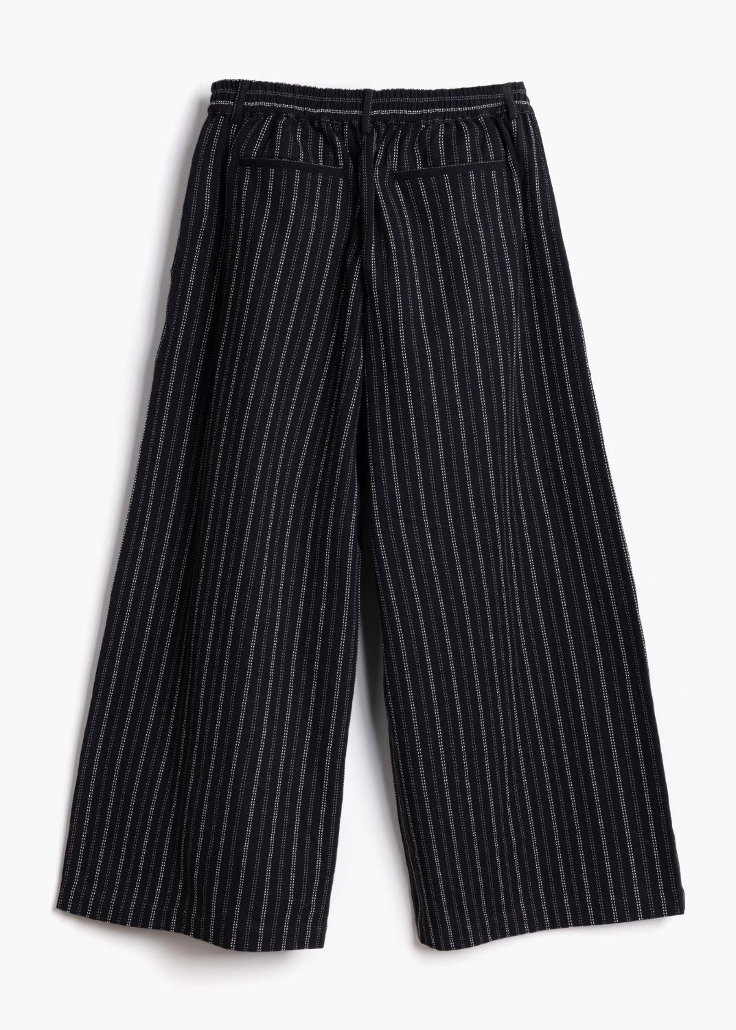 Full-length studio product shot of the black stripe Sarah Trousers showing the wide-leg cut back view