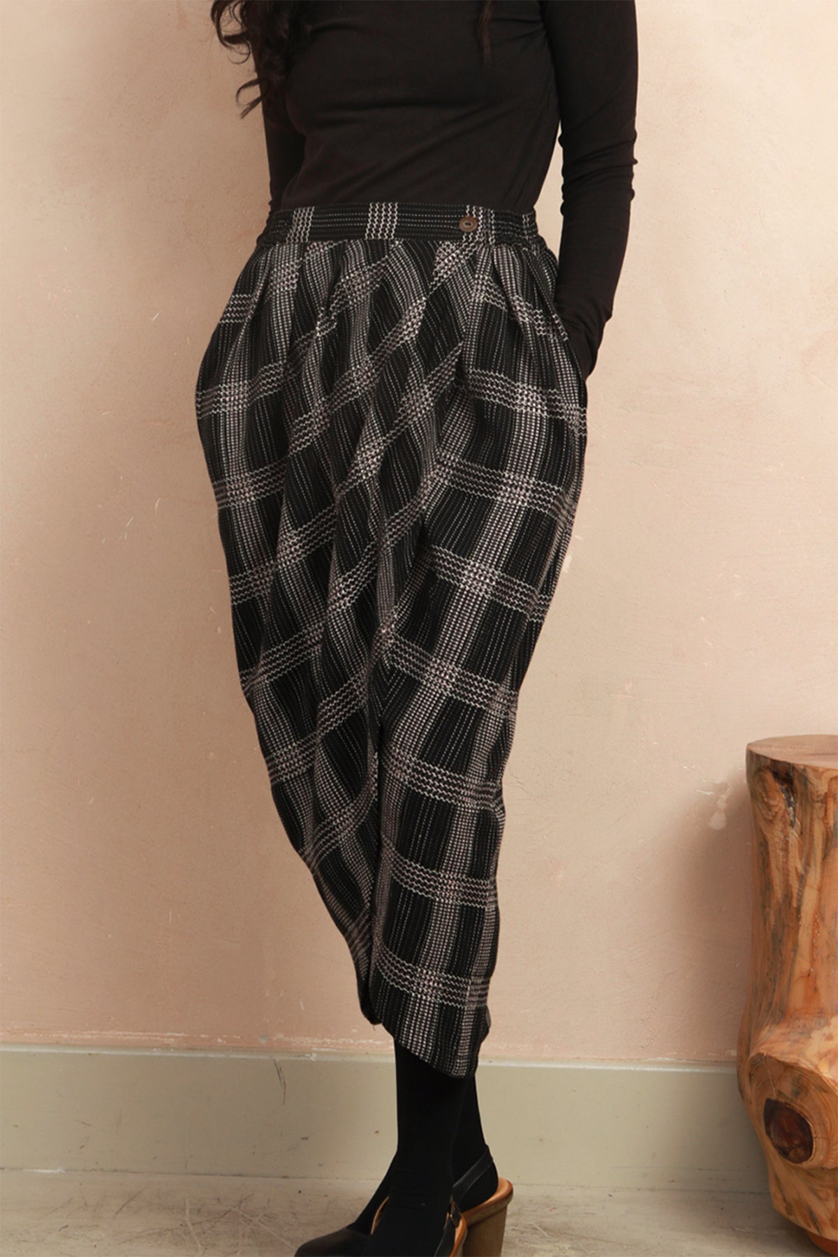 Close-up front view of the Venus Skirt showing the black and grey Nachnakhati stitch pattern and waist fit