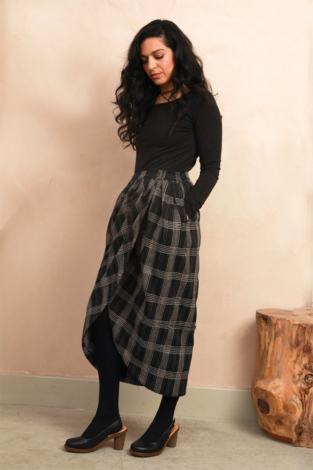 Close-up front view of the Venus Skirt showing the black and grey Nachnakhati stitch pattern and waist fit