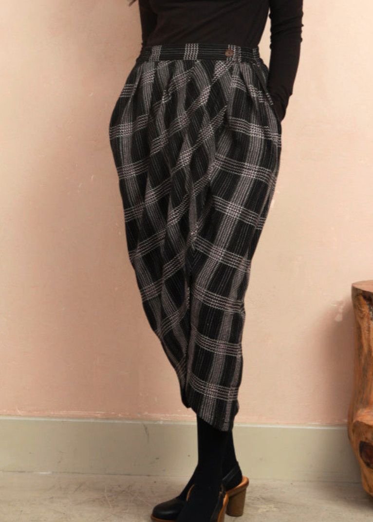 Close-up front view of the Venus Skirt showing the black and grey Nachnakhati stitch pattern and waist fit