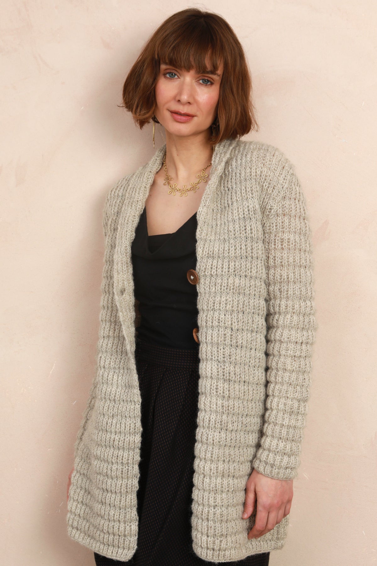 Model wearing the cozy Waffle Longline Cardigan