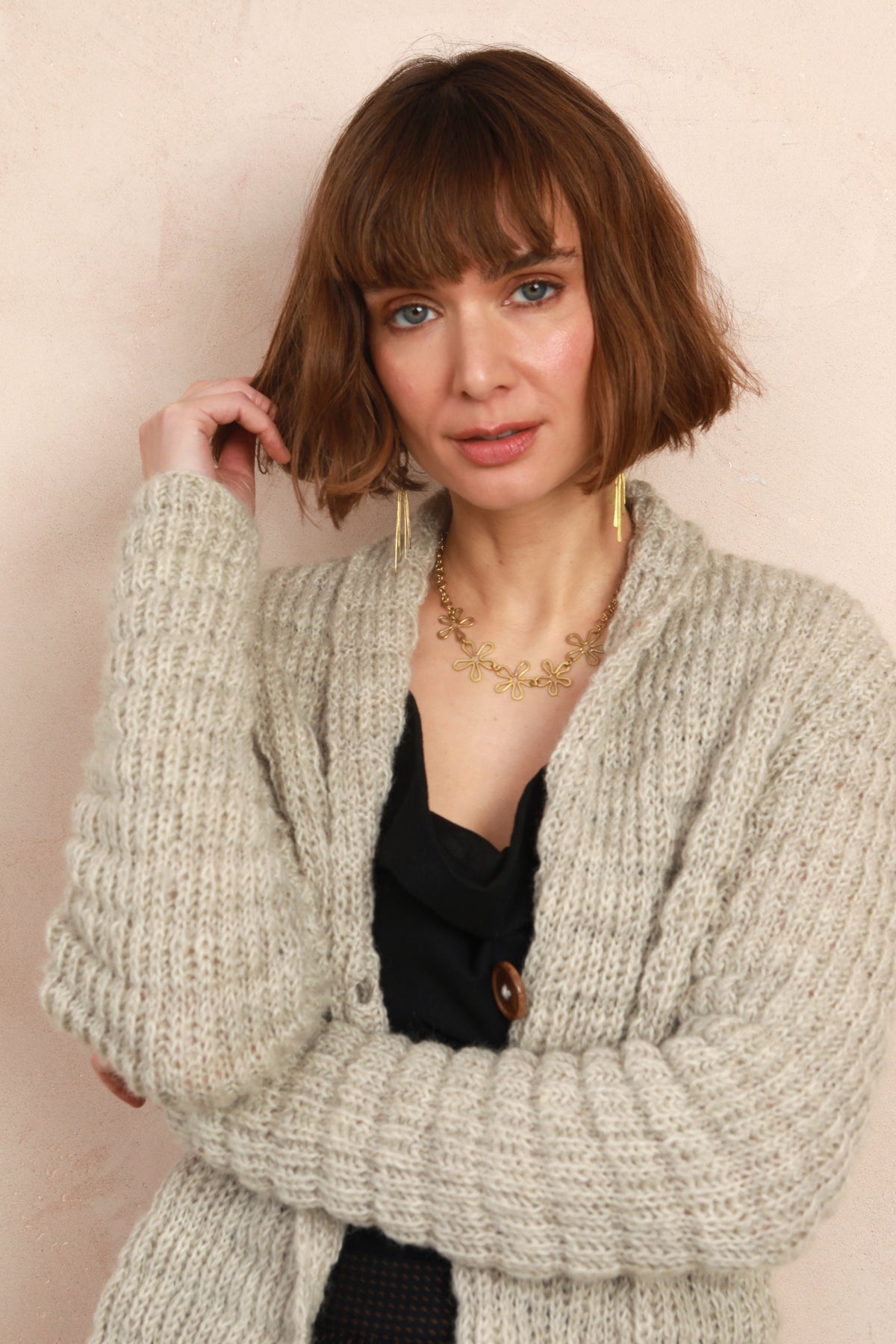 Model wearing the cozy Waffle Longline Cardigan