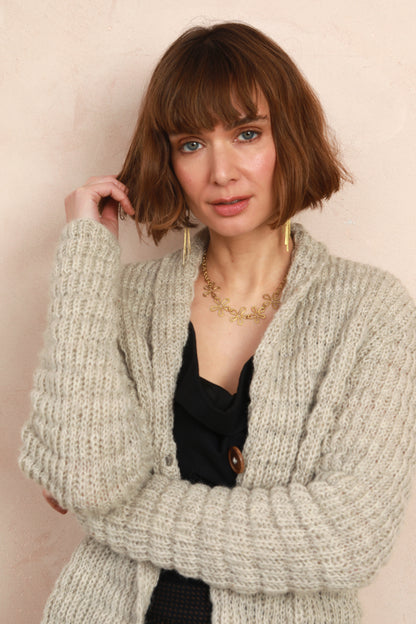 Model wearing the cozy Waffle Longline Cardigan
