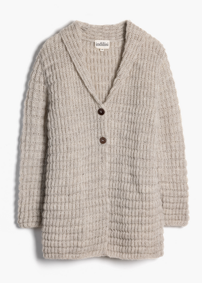 Studio flat lay shot of the hand-knit Waffle Longline Cardigan with natural wooden buttons